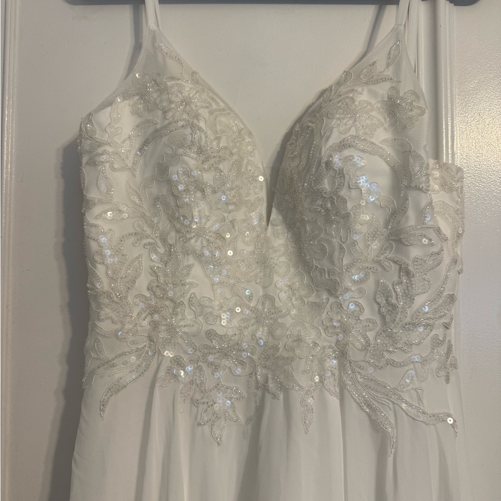 Elegant White Beaded Gown with corset back